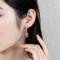 wholesale S925 silver asymmetric eye palm earrings for women, trendy exaggerated long drop earrings, wholesale from manufacturer-0-4