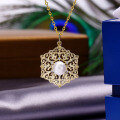 wholesale 9K gold retro hollow-out floral pearl pendant necklace for women, simple and versatile, perfect as a Mother's Day gift or sweater chain-0-2