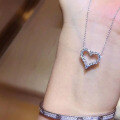 wholesale Sterling Silver Exquisite Heart-shaped Necklace for Women, Japanese and Korean Style, Light Luxury, Niche Design, Simple Full Diamond Hollow-out Pendant Choker-0-1