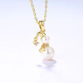 wholesale Best-selling new Christmas gift pendant - Gold and pearl snowman necklace for women, trendy and versatile-0-1