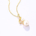 wholesale Best-selling new Christmas gift pendant - Gold and pearl snowman necklace for women, trendy and versatile-0-2