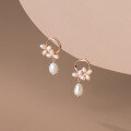 wholesale Sterling silver flower earrings for women with rice-shaped pearls and baroque pearls, face-slimming, Korean-style sweet earrings G141-0-3