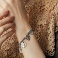 wholesale Copper-plated bright silver French retro relief portrait side chain bracelet for women, fashionable and unique accessories wholesale-0-1