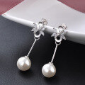 wholesale 925 Sterling Silver Minimalist Fresh Synthetic Pearl Earrings Korean Bow Pearl Stud Earrings for Women-0-0