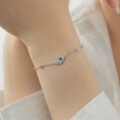 wholesale S925 sterling silver lightweight luxury Japanese-Korean women's bracelet with a unique small hand design, inlaid with blue zirconia, versatile evil eye bracelet-0-0