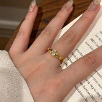 S925 Sterling Silver Gold-Plated Moissanite Starry Ring for Women-Golden oval diamond, 50 points (0.5 carats), with certificate, black card, and girdle inscription; Hong Kong serial number 17.