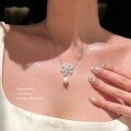 wholesale Sterling Silver Christmas Snowflake Necklace for Women with Pearl, Korean-style Minimalist Collarbone Chain, Fashionable and Luxurious Micro-Paved Jewelry for TikTok Live-0-1