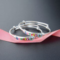 wholesale A pair of Korean-style cute baby bracelets in S999 pure silver with colorful oil-dripped flower "LOVELY" design, infant/child bangle jewelry-0-1