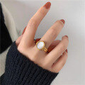 wholesale Metal material, cross-border Europe and America best-selling curved white mother-of-pearl oval ring for women, artistic vintage style, luxurious advanced sense, versatile wholesale-0-3