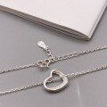 wholesale Metal material: 999 Silver Hollow diamond-inlaid irregular heart necklace, niche design, minimalist and elegant collarbone chain gift-0-3
