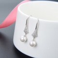 wholesale S925 Sterling Silver Pearl Earrings for Women, Fashionable and Lightly Luxurious Diamond-Encrusted Skirt Hem Earrings for Wholesale-0-1