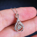 Sterling Silver Moving Heart Necklace with Teardrop Pendant-0-2
