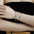 wholesale Cross-border live streaming of new S925 sterling silver bracelet for women, classic four-leaf clover design with black onyx, turquoise, and white mother-of-pearl inlay-0-1