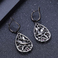 wholesale S925 sterling silver earrings with original design "Paradise of Birds", inlaid with natural topaz and garnet, black-0-3