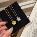 wholesale S925 silver gold-plated small floral pendant necklace with brushed finish, featuring a golden flower design in a new Chinese style-0-2