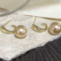 wholesale Metal material, Chao Xiaobai exquisite champagne color pearl earrings for women, elegant and versatile,, fashionable and unique ear studs-0-1
