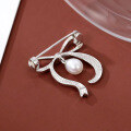 wholesale S925 metal cross-border badge best-selling bow brooch pearl jewelry wholesale high-end niche accessories autumn winter-0-1