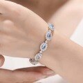 wholesale S925 silver plated with 18k gold small fresh natural topaz egg-shaped halo bracelet-0-4