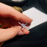 Sterling Silver 1ct Four-Prong Oval Moissanite Solitaire Engagement Ring-High-carbon diamond, 1 carat oval, closed-cut, size 11.