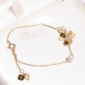 wholesale 18K Gold Metal Material Style Assortment Trifoliate Bracelet with Diamonds and White Pearls Available for Dropshipping-0-1