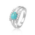 wholesale S925 sterling silver plated with 18k gold, small designer Sleeping Beauty turquoise ring with topaz, cross-border-0-4