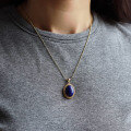 wholesale S925 silver gold-plated with natural lapis lazuli cabochon, auspicious cloud pattern, hollow-out ethnic retro high-end luxury pendant-0-3