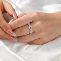 wholesale S925 Sterling Silver Women's Minimalist Ring with Unique Design, High-End Luxury Feel, Rope Pattern Interlocking Band Featuring Moissanite Stone-0-3