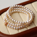 wholesale 18k gold multi-strand bracelet set with 5-6mm freshwater pearls and designed with antique openwork accents-0-1