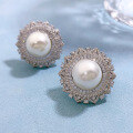 wholesale 925 silver flower-shaped pearl earrings with 12mm shell pearls, European and American women's earrings and ear clips-0-1