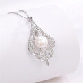 wholesale Silver freshwater pearl necklace for women, elegant and versatile with a vintage-inspired design, featuring swaying window-pattern pendants, a minimalist statement piece-0-0