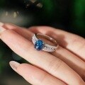 wholesale S925 Sterling Silver Wedding Style Ring for Women with Sparkling Oval Blue Zirconia and Row of Diamonds Design, Luxurious and Elegant Christmas Ring-0-1