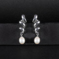 wholesale S925 sterling silver new natural freshwater pearl earrings for women, fashionable and luxurious high-end design, 8mm rice pearl ear studs-0-0