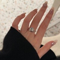 wholesale S925 Sterling Silver White Gold Light Luxury Niche Design Irregular Streamlined Teardrop Moissanite High Carbon Diamond Ring-White gold Adjustable opening