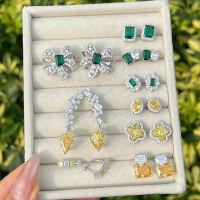 wholesale S925 Sterling Silver INS Style Four-Leaf Clover Butterfly Geometric Emerald Green and Yellow Zircon Design Light Luxury Advanced Earrings-White gold with green diamond DY1D0298-SW-WG 925 silver