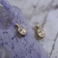 wholesale 9K gold oval-shaped white zircon pendant with a design-inspired K gold drop-0-1