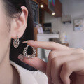 wholesale S925 silver retro fashion commuter essential twist-shaped lightweight luxury design earrings ear clasps-0-3