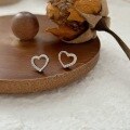 wholesale Metal Material: S999 Silver Hollow Heart Stud Earrings for Women, Minimalist Niche Student Earrings-0-0