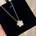 wholesale S925 silver gold-plated small floral pendant necklace with brushed finish, featuring a golden flower design in a new Chinese style-0-0