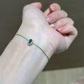 wholesale S925 Sterling Silver Vintage Emerald Bracelet with Green Gemstone Surrounded by Oval Diamonds and Woven Cord, Minimalist Niche Hand Accessory-0-0