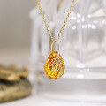 wholesale Metal material with natural gemstone amber pendant, classical leaf openwork pattern, adorned with iolite, fashionable retro and exquisite pendant-0-3