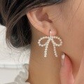 wholesale S925 Sterling Silver Pearl Woven Bow Earrings for Women, Small and Exquisite, Light Luxury Fashion Ear Clips-0-0