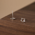 wholesale S925 sterling silver minimalist cat stud earrings with single diamond and hollow-out design, elegant feline accessory M00068-0-3