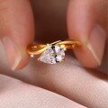 wholesale S925 gold-colored moissanite ring with a teardrop center stone, minimalist design, slimming effect for women, best-selling style-0-3