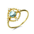 wholesale 14K gold-plated S925 sterling silver London blue topaz ring for women, Japanese-style luxury hollow round disk hand accessory, dropshipping-0-1