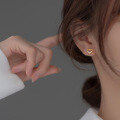 wholesale S925 silver hollow heart-shaped stud earrings, Korean-style simple and sweet, with diamond accents Model M01682-0-1