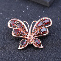 wholesale S925 silver designer-style natural gemstone brooch with butterfly design and classical elegance, featuring genuine garnet-0-1