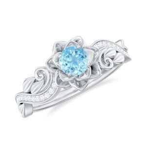 A Aquamarine Moissanite Ring