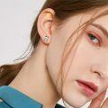 wholesale 925 Sterling Silver Cute Cow Holding Heart Moonstone Stud Earrings-0-1