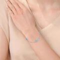 wholesale 925 Sterling Silver Hamsa Hand Bracelet With Blue Crystal And Charm Accents-0-4