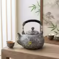 wholesale Pure 999 Fine Silver Exquisite Handcrafted Silver-Tone Teapot with Detailed Mountain Relief and Shimmering Accents - Handicraft-0-0